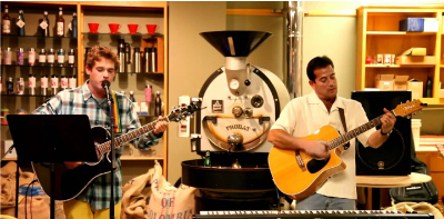 2 guys playing guitar