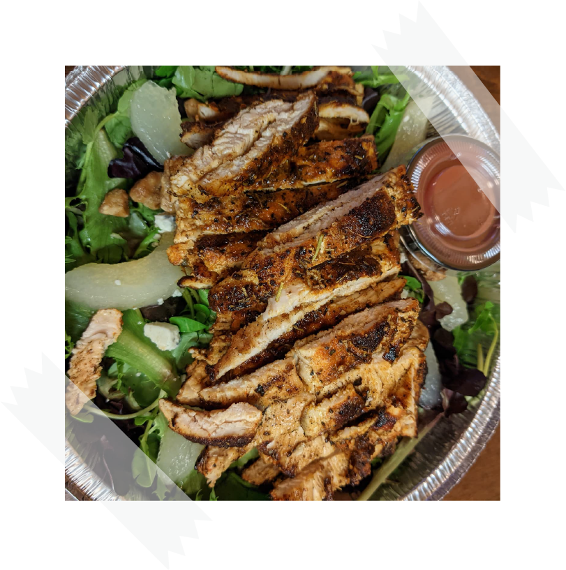 grilled chicken fajita ontop of fresh salad