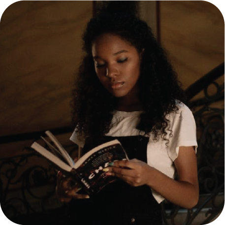 Image of a girl reading a book