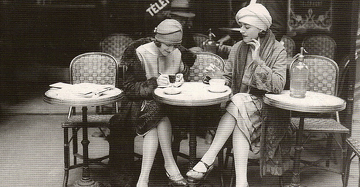 woman signing a check.